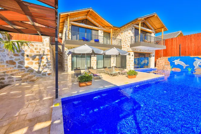 Kalkan Kiralık Tatil Villası Teciroğlu 2, Patara Bölgesinde 3 yatak odalı 6 kişi kapasiteli doğa içerisinde taş yapılı oldukça lüks ve modern size özel kiralık villamız.